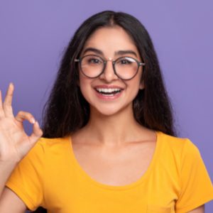 happy-insian-woman-gesturing-ok-sign-and-smiling-92s8zbs-jpg